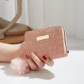 Pink short wallet with cute pom pom charm and clover embossed texture for women casual use. - Pink