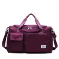 Large capacity purple travel duffel bag with separate shoe compartment and multiple pockets. - Deep purple