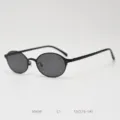 Small oval vintage metal sunglasses detail, black frame close-up, classic retro eyewear look. - Matte Black Solid Grey C1
