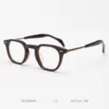 Detailed shot of Japanese vintage tortoiseshell acetate optical glasses frame with titanium temples. - Transparent Tea & Matte Bronze C2