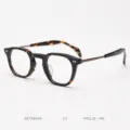 Detailed view of Japanese tortoise shell acetate optical glasses frame with titanium temples. - Yellow Tortoiseshell/Matte Antique Bronze C5
