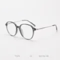 Detail shot of TR90 thin-edge optical glasses frame in translucent grey colorway. - Transparent Gray C2