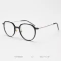 Stylish round optical glasses frame with thin metal temples for men and women daily wear. - Glossy Black C1