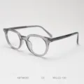 Detailed view of the translucent grey vintage round eyeglasses frame, lightweight design. - Transparent Grey C3