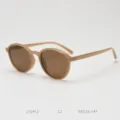 Detail view of stylish retro TR90 polarized sunglasses in light beige, trendy daily eyewear. - Milk Tea Lenses C2