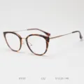 Montatura per occhiali da vista cat-eye con motivo tartarugato e dettagli in metallo. - Tartarugato oro C32