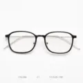 Detailed view of the Korean style TR90 optical glasses frame with slim black rim. - Glossy Black C1