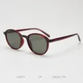Detail shot of retro round TR90 polarized sunglasses in dark red, stylish eyewear for daily wear. - Wine Red with G15 Lenses C4