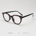 Tortoise shell round eyeglass frame detail shot, classic vintage optical frame design. - Hawksbill Tortoiseshell C6