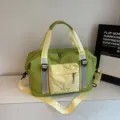 Green travel duffel bag with yellow straps, large capacity casual sports fitness luggage. - Green