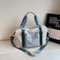 Large capacity travel duffel bag, light grey with blue green straps, sports gym bag. - Gray