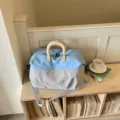 Grand sac de voyage de sport avec design bicolore pour les déplacements quotidiens et les loisirs. - 40*23*27 / Gris