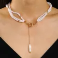 Close-up of vintage multi-strand pearl necklace with gold OT toggle clasp and pearl pendant. - Gold Baroque Pearl OT Buckle Style (kc金 4618)