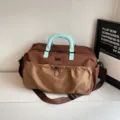 Large capacity travel duffel bag for women and men, gym sports luggage and short trip handbag. - Brown