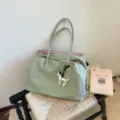 Light green chic tote bag with cute dog charm, large capacity casual shoulder bag. - With Pendant / Green Grape Guava