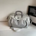 Large capacity travel duffel bag for women, lightweight gym sports bag for weekend trips. - Gray