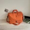 Large capacity travel duffel bag, waterproof gym sports bag for women and men, weekend overnight bag. - Orange