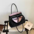 Black canvas tote bag with pink interior lining, large capacity single shoulder commuting bag. - No Pendant / Pink