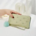 Light green women's wallet with cute heart embroidery, wrist strap and fluffy pom-pom pendant. - Green
