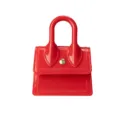 Rote Mini Jelly Handtasche für Damen, glänzende PVC Umhängetasche mit Griff und Druckknopf. - Rot
