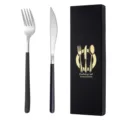 Set di posate in acciaio inox con manico nero, include forchetta e coltello in confezione. - Coltello + forchetta / Nero e argento