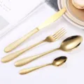 Gouden roestvrijstalen bestekset, 4-delige gestructureerde bestekset voor de eettafel. - Glanzend gouden 4-delige set