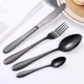 Zwart roestvrij staal bestek set 4-delig mes vork lepel met getextureerde handgreep design. - Zwarte 4-delige set