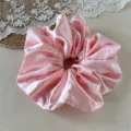 Pink satin hair scrunchie detail shot, showcasing smooth glossy fabric texture for daily use. - Large Light Pink Hair Accessory 20cm