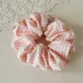 French style pink and white plaid hair scrunchie close-up detail, soft fabric elastic hair tie. - Regular Fit / Orange Pink