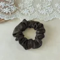 Close-up detail of dark brown satin hair scrunchie, smooth silk texture for daily styling. - 2cm Width / Dark Coffee