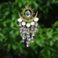 Crystal suncatcher hanging ornament with sun and moon metal design for garden decor. - New Flame Moon / Purple