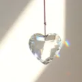 Crystal heart suncatcher pendant crystal detail shot showing prismatic light refraction. - Heart / 30mm / Clear