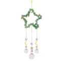 Détail d'attrape-soleil en cristal avec cadre étoile en aventurine et boules. - Étoile à cinq branches en aventurine verte de 10 cm