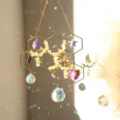 Honeycomb suncatcher with natural crystal chips and rainbow light reflection pendants. - Citrine