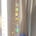 Detailed view of the golden crystal suncatcher featuring a tree of life and rainbow prism. - Green Aventurine Tree of Life / 43cm
