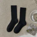 Black ribbed knit socks, classic solid color mid-calf casual warm socks for daily wear. - One Size / Black Vertical Stripe