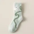 Cozy fuzzy coral fleece warm socks in light green with cute animal pattern for winter indoor wear. - One Size / Light Blue