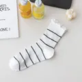 White striped mesh mid-tube socks with cute lettuce edge for women spring summer wear. - One Size / Striped White