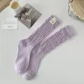 Chaussettes empilées violet clair pour femmes, chaussettes unies décontractées avec étiquette. - Taille unique / Violet