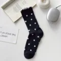 Black polka dot cotton mid-tube socks with ruffled lace trim, breathable and stylish. - One Size / Black