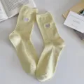 Korean style colorful speckle mid tube socks with cute grey heart embroidery for women. - Yellow
