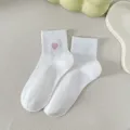 White cotton ankle socks featuring a cute pink heart embroidery design, breathable and soft. - One Size / Pure White