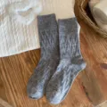 Dark grey wool blend mid-tube socks with vintage embossed pattern, cozy winter footwear. - One Size / Light Gray