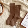 Brown cable knit wool winter socks with cute heart patterns and sweet embroidered cuff details. - One Size / Medium Coffee