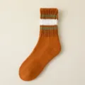Women's thick warm cotton mid-calf socks featuring cozy striped cuffs for winter wear. - One Size / Orange Red