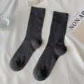 Dark grey solid color ribbed crew socks for women, breathable cotton blend for daily wear. - One Size / Dark Gray