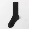Black ribbed mid-calf crew socks, classic solid color knit hosiery daily wear variant. - One Size / Black