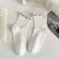 White ruffled JK mid-calf socks featuring elegant pearls, perfect for Japanese Lolita style. - One Size / Pearl White
