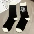 Black and white color block crew socks with stylish letter print for street style daily wear. - One Size / Black/White