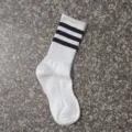 Classic white mid-tube socks featuring three black stripes, comfortable daily sportswear. - White 3-Stripe